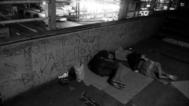 Cruel World. Homeless children sleeping on the EDSA-Guevarra Pedestrian Overpass, Mandaluyong City, Philippines. 2017 February 24.   Photo by Galileo de Guzman Castillo